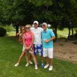 couples posing during golf outing